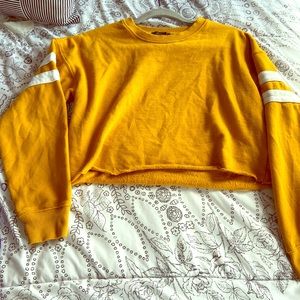 Cropped mustard yellow long sleeve top